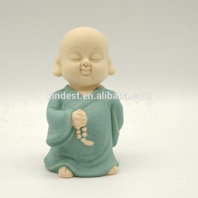 Customized mini size ceramic young monk home decor cheap